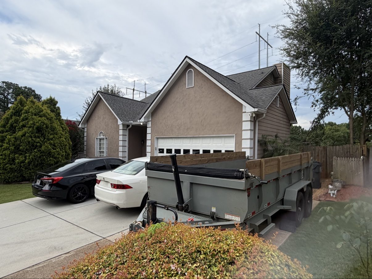 McDaniel Materials dump trailer parked at a customer's home